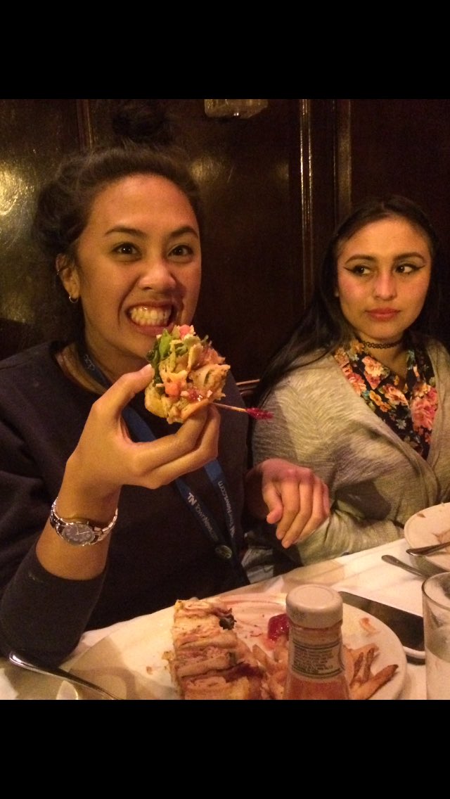 RClinton3's tweet photo. @marcesway getting strong side eye from EIC @NahhRoxyy while wasting food then she gets at it again. #notfinishing https://t.co/vw4AmkQl0D