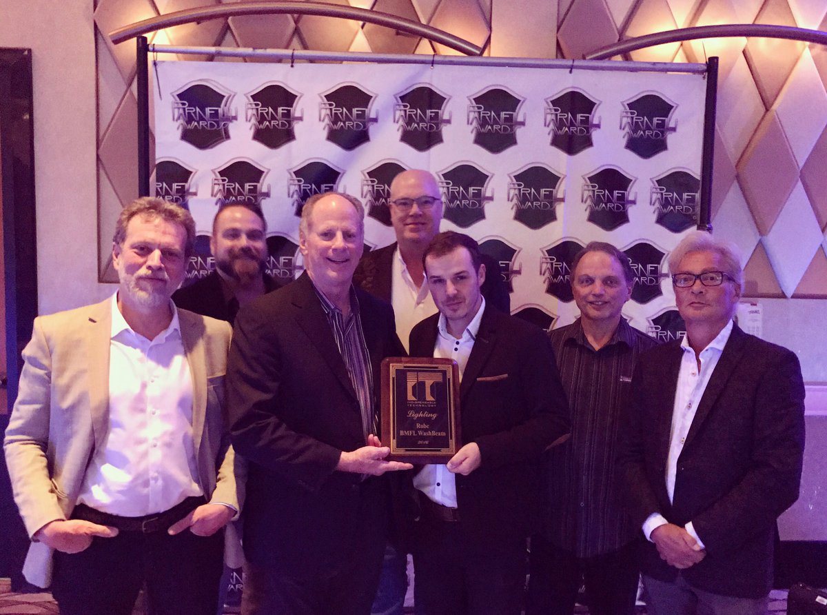 TheRobeWay's tweet photo. The @Robelighting team accepting the @PLSNMagazine #ParnelliAwards #IndispensableLightingTechnology Award for #BMFL WashBeam @RioVegas https://t.co/nSsg9HZdqd