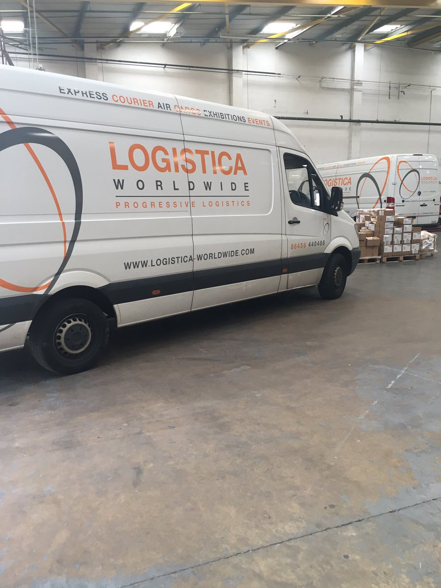 LogisticaUK's tweet photo. Photo from Friday of two of our vans finished unloading parcel and freight collections into cages to be exported that night. #TeamLogistica https://t.co/6SzhohTaDm