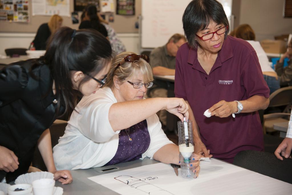 Educators made water filtration systems at a showing the