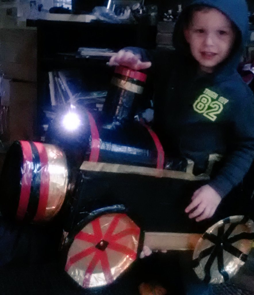 Outside_Tribe's tweet photo. he's so excited & he fits in it perfectly.
just need to add suspenders 🚂
#DIYTrain #ducttape #cardboard https://t.co/0GKoeyqPWA