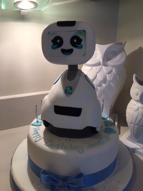 adoptbuddy's tweet image. A fan of #Buddy, the companion #robot has created a delicious work under the effigy of Buddy thanks to @CakeStore London. #DIY