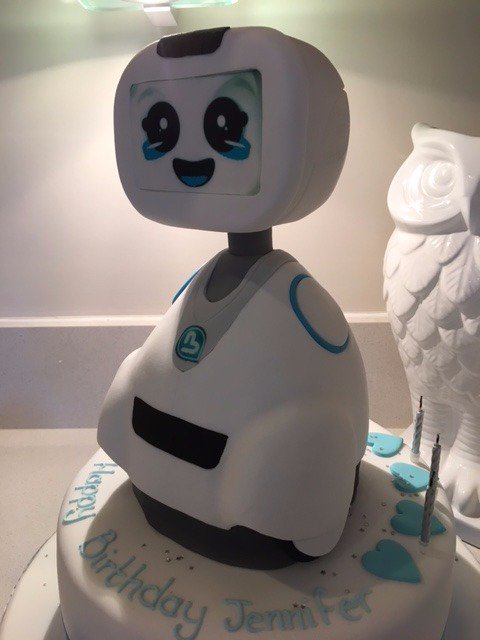 adoptbuddy's tweet image. A fan of #Buddy, the companion #robot has created a delicious work under the effigy of Buddy thanks to @CakeStore London. #DIY