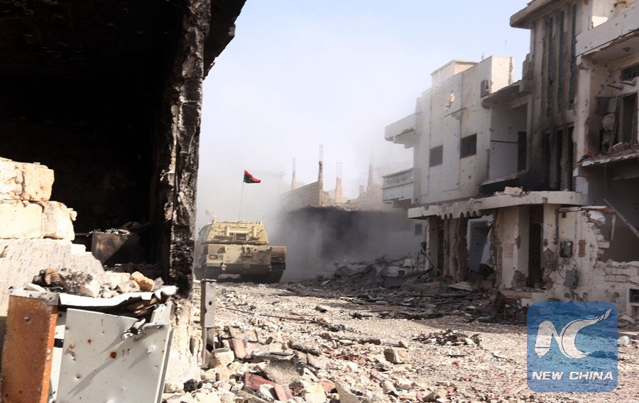 XHNews's tweet photo. Libyan government frees 24 civilians held captive by IS in Sirte https://t.co/cbB4kpG9db https://t.co/XdQhQz8xKw