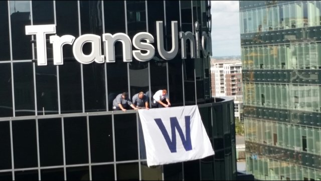 TransUnion's tweet photo. Congratulations to the Chicago @Cubs on their huge win this weekend! We're proud to #FlyTheW at our office. #LifeAtTU https://t.co/CTHmCjO9gQ