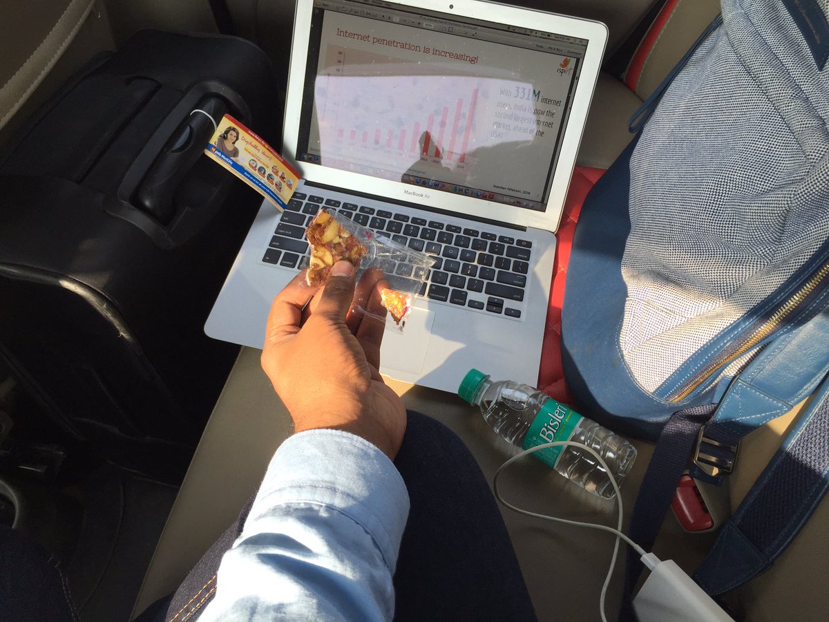 BKartRed's tweet photo. Who needs an office when you can set up one on the back seat of @Olacabs prime and brave the traffic and 90 min ride - snack+wifi enabled https://t.co/MU07CL4dMM