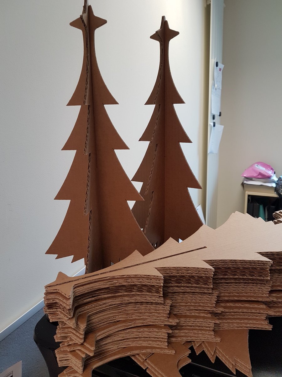VoxPRTeam's tweet photo. GWP's cardboard Christmas trees all now ready for delivery to Gloucester Deaf Association for the children to decorate @GWPGroup @glosdeaf https://t.co/IFGhYTOfoY