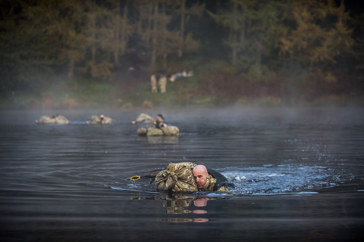 BritishArmy's tweet photo. The water crossing is one of the most arduous challenges of the international #CambrianPatrol, which has been taking place in Wales https://t.co/1hPKgs9JnT