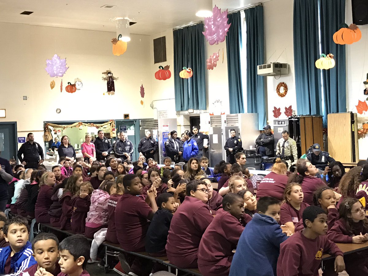 NYPD121Pct's tweet photo. Chief Jones as Principal for a day at St. Adalberts School #NoHomeworkToday https://t.co/3mdkSZT35G