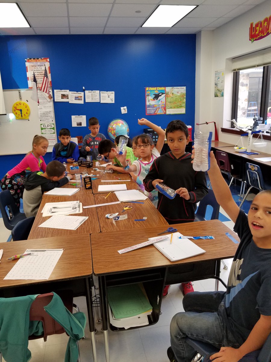 RussellCamacho6's tweet photo. Students having fun making a tool to measure weather. #Raingauge #october16nse https://t.co/iOSiPfKmIT