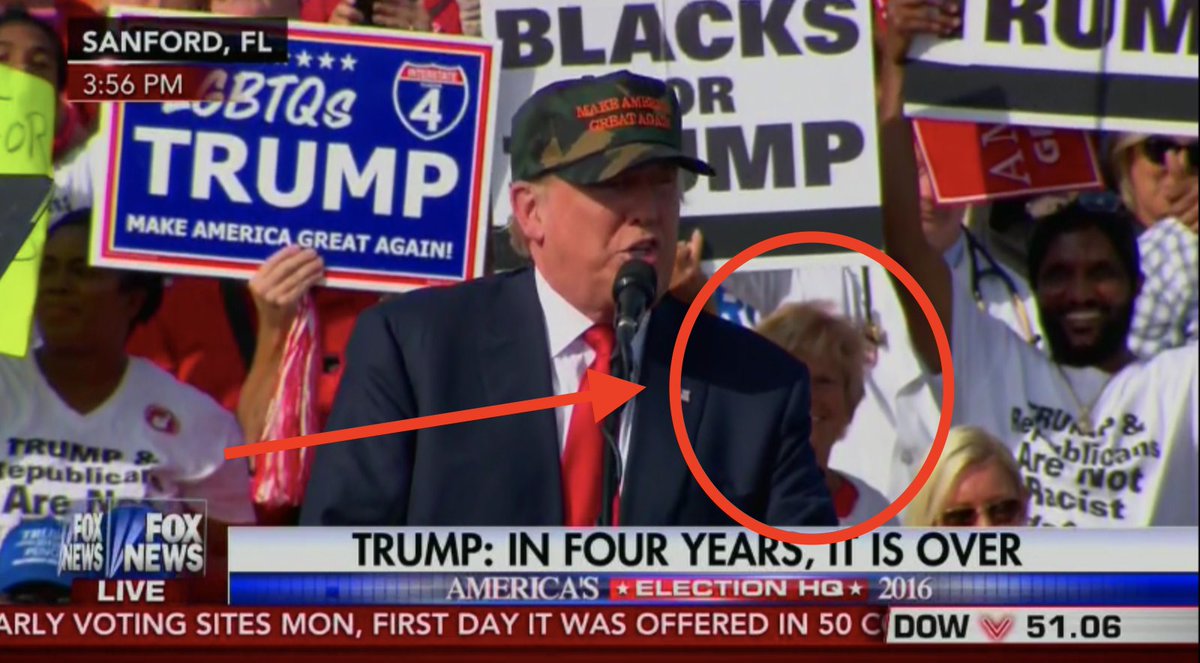 Of note: The person holding the “BLACKS FOR TRUMP” sign is white.