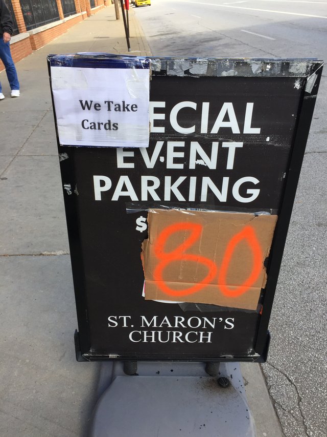 darrenrovell's tweet photo. Parking at a church garage two blocks from Progressive Field for tonight's World Series game https://t.co/EIs7a0tP4p
