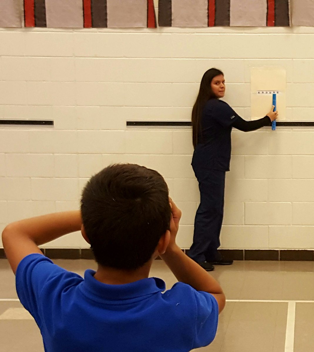 mabma_abma's tweet photo. @mooremustangs Moore nursing student Sindi Lopez performing vision screenings at Harstern Elementary https://t.co/C52x7tjfWD