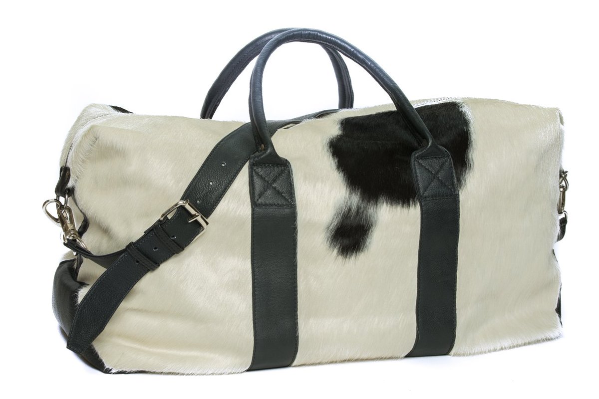 OranLeather's tweet photo. 'Texas' hide travel bag is the baby version of our very popular 'Rodeo' travel bag. Dimensions of Texas are L60x D30 x H31cm. https://t.co/b3tntcgNlN