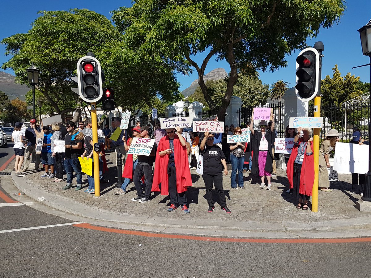 PaulHermanCPT's tweet photo. Around 60 UCT staff and supporters outside Parliament so far in protest of university fees crisis on #MTBPS2016 day. #Fees2016 @News24 https://t.co/PyeHQLAmXN