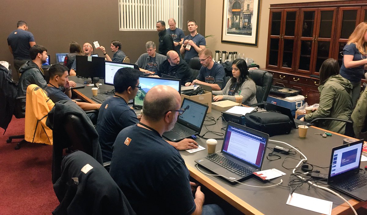 BradWindecker's tweet photo. Wow! Arrived to the conference to find our team already war rooming it! This team is pumped! #Orchestrate2016 https://t.co/ahe9GSPpVW