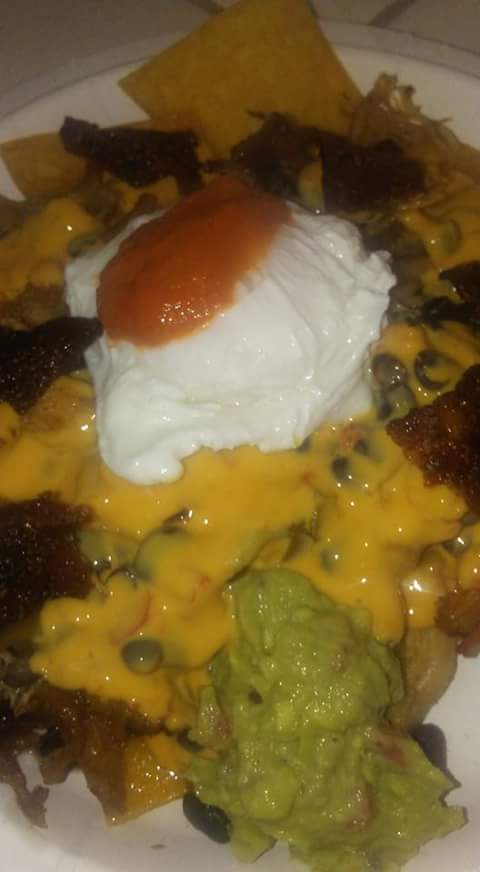 ChefJoeJ's tweet image. #brunch nachos - housemade chips, strawberry-jalapeno salsa, guac, carnitas, taco bacon, black beans w/ chilies, poached egg, spicy queso