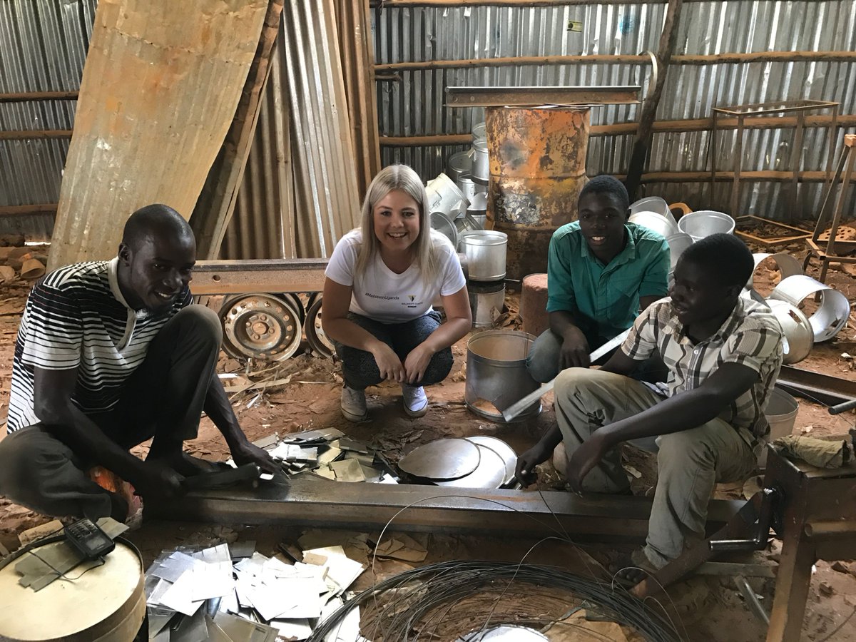 WillmottDixon's tweet photo. #MelissaInUganda - Melissa seeing how the #cookstoves are made and used in Uganda.  https://t.co/EUqCk3at8A https://t.co/LH1ekzUTsU