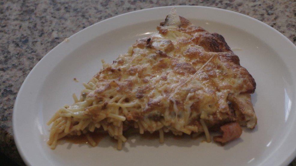 FOXBaltimore's tweet photo. #Pizzaghetti (spaghetti stuffed inside pizza) https://t.co/HDhbgzSsvb https://t.co/RLDXP3Y3bk