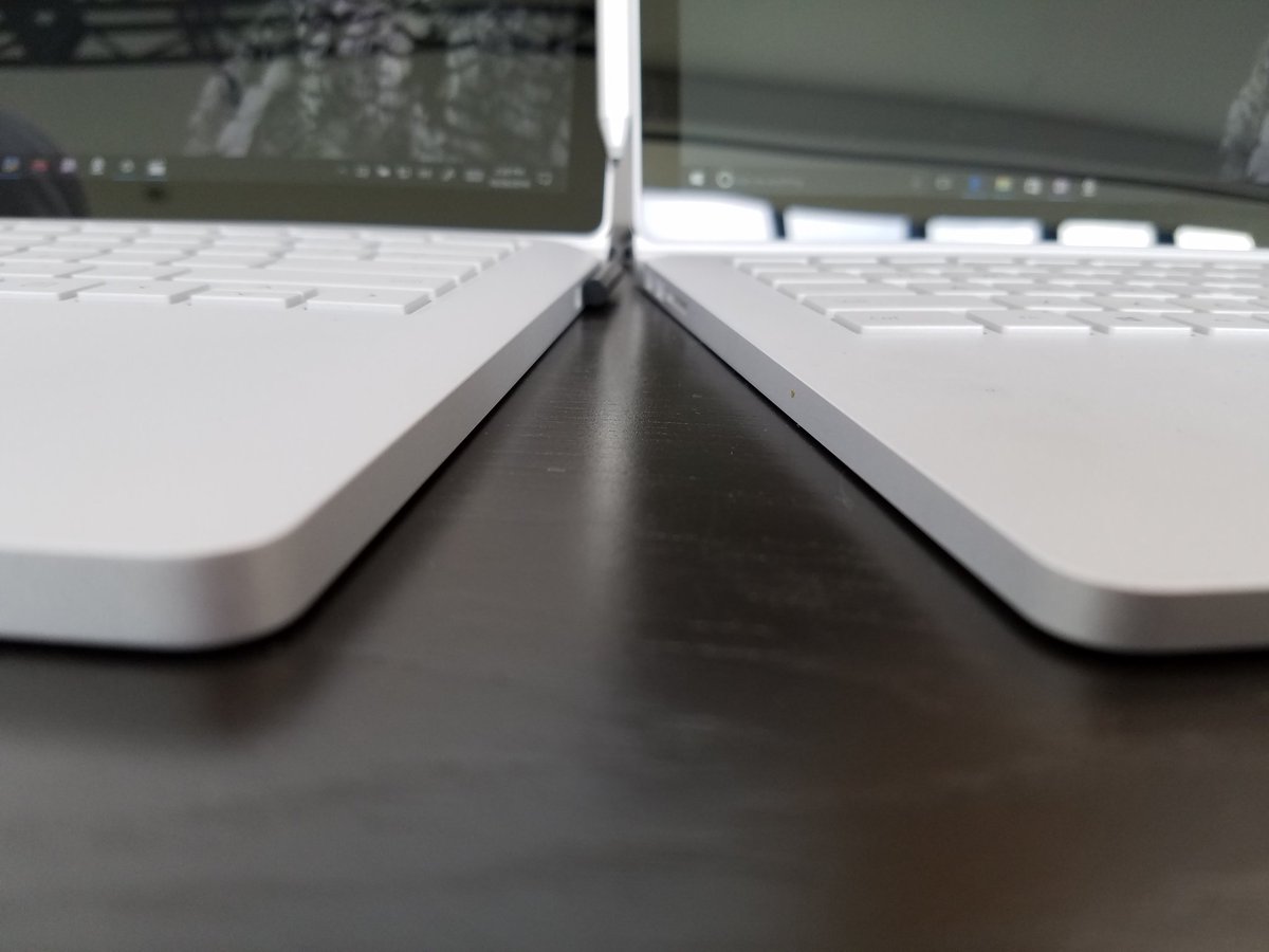 gloria_sin's tweet photo. Here are the 1st-gen(R) & 2016(L) #SurfaceBooks side-by-side, w/ the more powerful one ever so slightly thicker but not much heavier https://t.co/P6nwwyR9Hc