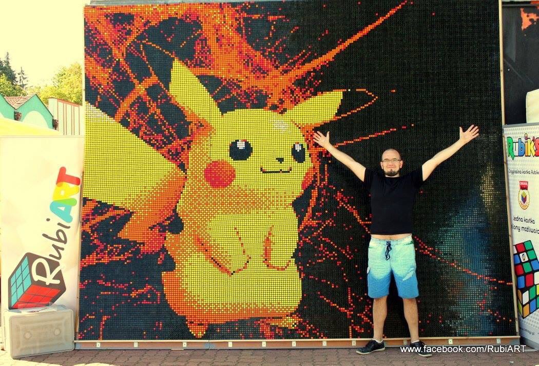 PokeTrends's tweet image. A Pikachu mural made from Rubik's Cube pieces.
