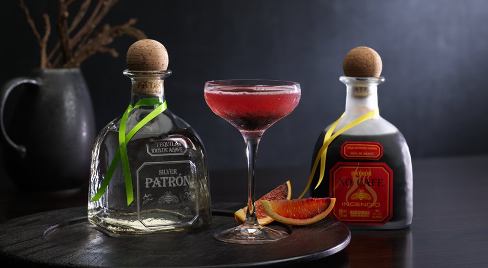 Patron's tweet photo. Get your hands on a mysterious margarita this #Halloween. Try our Blood Orange Margarita. https://t.co/gTXHewMyoQ https://t.co/d8oGsR3ZgK