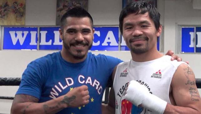 TyCSports's tweet image. #Boxeo Cuellar conoció a Pacquiao: bit.ly/2ectIxI