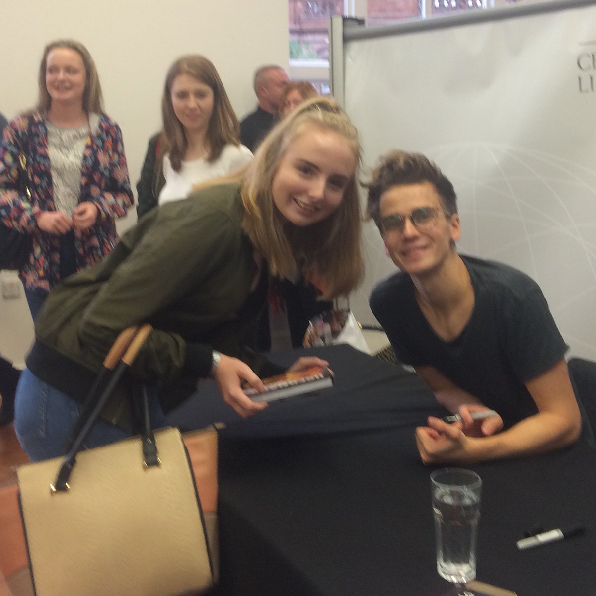 capri_sugg's tweet photo. I'm so awkward but his little smile😻😭@Joe_Sugg #UsernameRegenerated #UsernameRegeneratedBookTour https://t.co/XySKyiksXl
