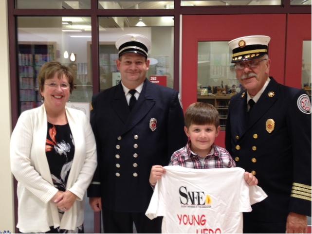 MassDFS's tweet photo. #Webster #SAFEProgram #YoungHero honored Tuesday at fire headquarters Tues. night. Reacted fast to a fire at school. https://t.co/pVBkj4JR54 https://t.co/lPbY3mFyXo