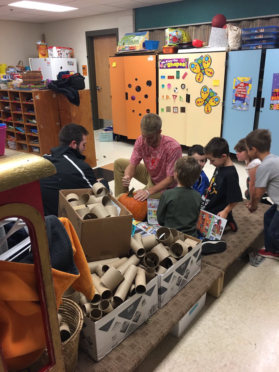 coachdanedamron's tweet photo. @UVaWise_FB players carving pumpkins at Norton Elementary School.  #cavsinthecommunity #keepdigging https://t.co/EkhFlfvJNN