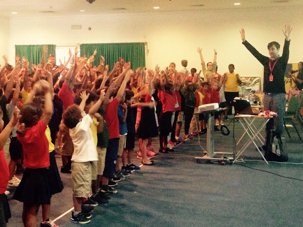 Jenny_Mitchell6's tweet photo. Our visiting author, David Bedford teaching our primary students a dance at the assembly! #kicslearns #kicsprimary https://t.co/IfGWs03ugC