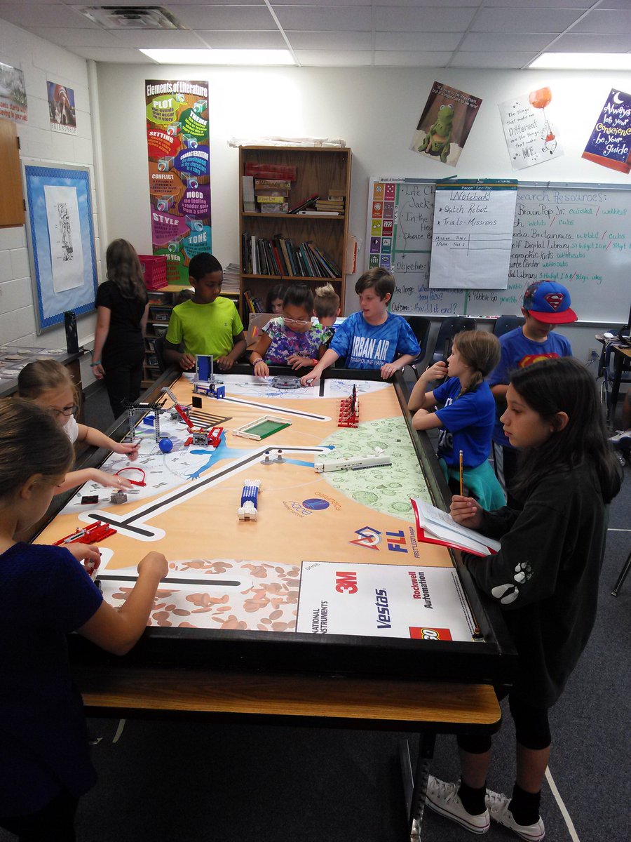 ALPHA students collaborate on team Lego Mindstorms missions for competition. #misdgt #webblc #legomindstorms