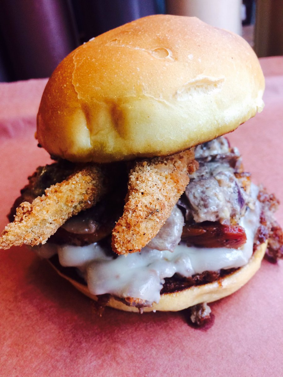 Cheshire Cat-Single Burger,Pork Belly, Mushroom Ragout,Smoked Fried Pickle Spears, and Provolone.