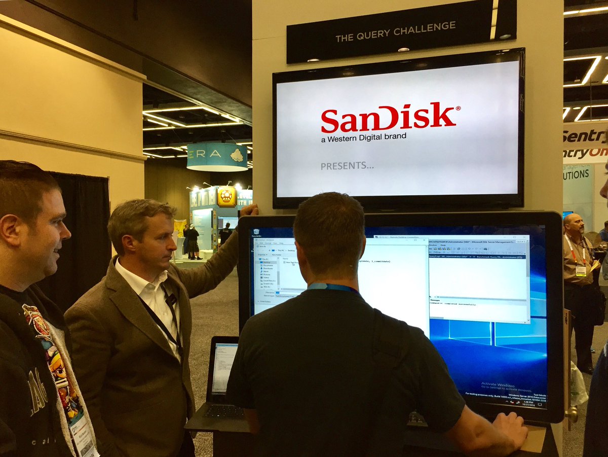 aspiringgeek's tweet image. #QueryChallenge mastermind @HoldfastSQL provides guidance to eager contestants—come play! @SanDiskDataCtr booth #222 @sqlpass #SQLSummit