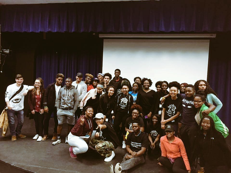 McCluerNorthHS's tweet photo. Ss from @FergFlorSchools  w/ G2C students from Francis Howell posed for this pic at last night's Blue/Brown Eyes Experiment movie night! https://t.co/RmpFnMkgj1