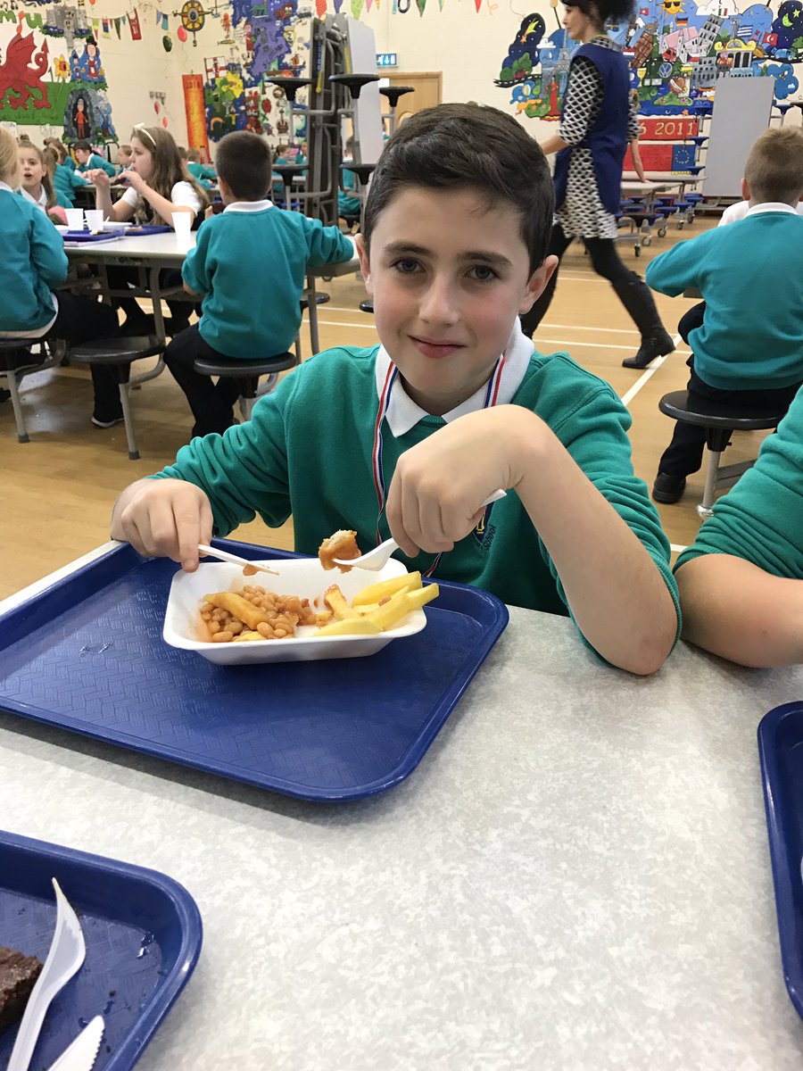 Year 6 enjoying Fish n chip Friday @RogPrmSch