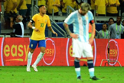 Brazil under inspiration of Neymar roared to an impressive World Cup qualifying 3-0 defeat over Argentina in their first game at the Mineirao Stadium