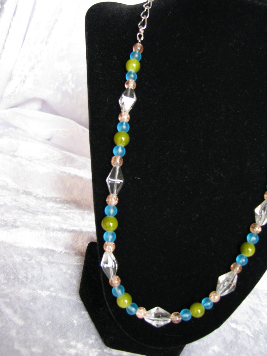randomjewelry's tweet photo. Olive Green, Pink, Dark Aqua Blue Beaded and Chain Necklace https://t.co/WyvOgC47kb #Handmade #BrightSilver https://t.co/f7NmfpTy6U