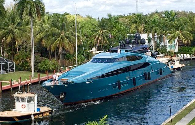 M/Y Blue Ice being escorted through the Florida waterways