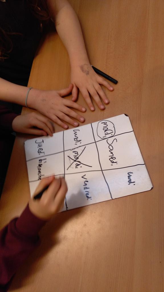 tay1plus2's tweet photo. Pupils @RosemountPS learning to write the days of the week in French through a game of noughts and crosses. https://t.co/RFRMY1HW1o