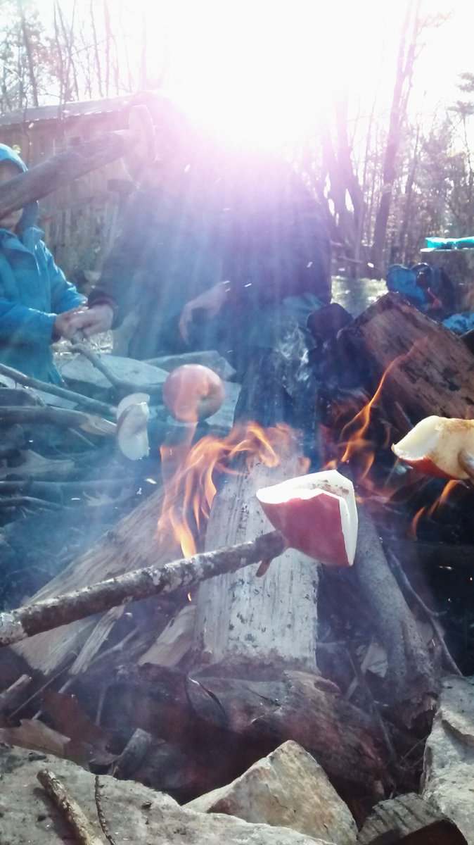 The air is cold, but the fire and our hearts are warm. #forestschool #campfirecooking #natureforall