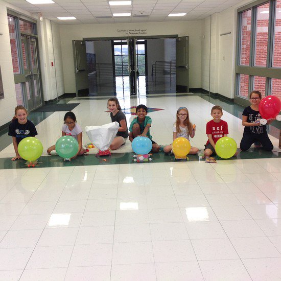 NEISDGT's tweet photo. Fourth graders compete to see who has the fastest balloon powered car and which car travels the longest distance.  #neisdgt https://t.co/gA9sa2Sp6t