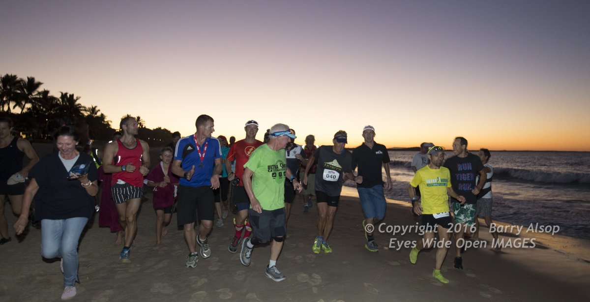 UltramanOz's tweet photo. Favourite Photos 2016:  Daryl Allen approaches Day 3 finish line with less than a minute to spare, surrounded by Ultraman Family. https://t.co/d1AXQJ17de
