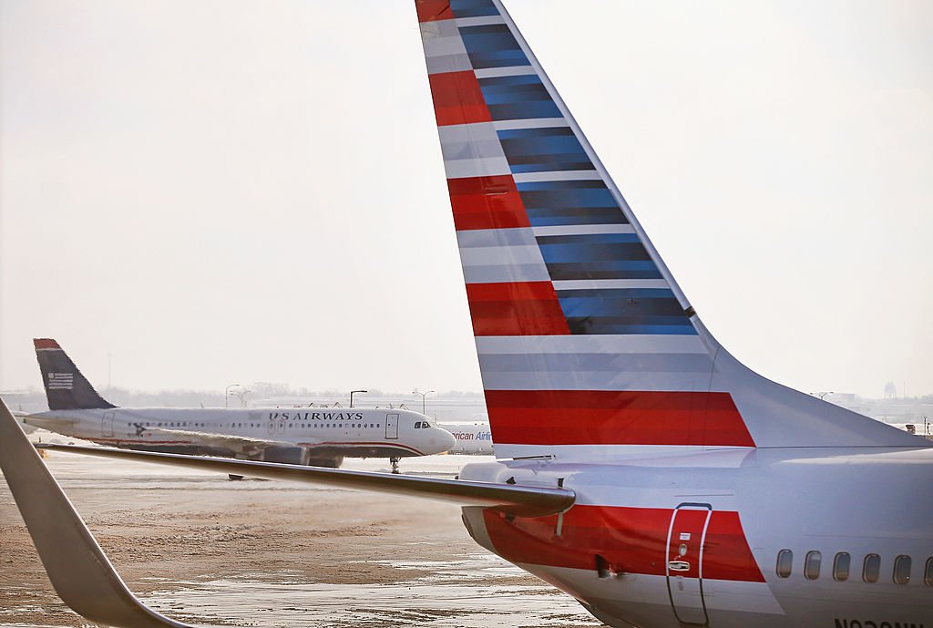 business's tweet photo. American Airlines goes all in on faster Wi-Fi https://t.co/qY7W0uEbWf https://t.co/PN0kL6fDDu