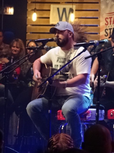 NashvilleBecca's tweet photo. Love hearing @tylerfarr sing the #JonathanSingleton penned song "A Guy Walks Into A Bar" at #starsandstrings https://t.co/OkA8xz2xSt