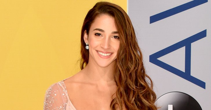 POPSUGARWell's tweet photo. Olympic champion @Aly_Raisman opens up about how she learned to embrace her body shape: https://t.co/NEhRLDoFIA https://t.co/wGo2WZLVy9