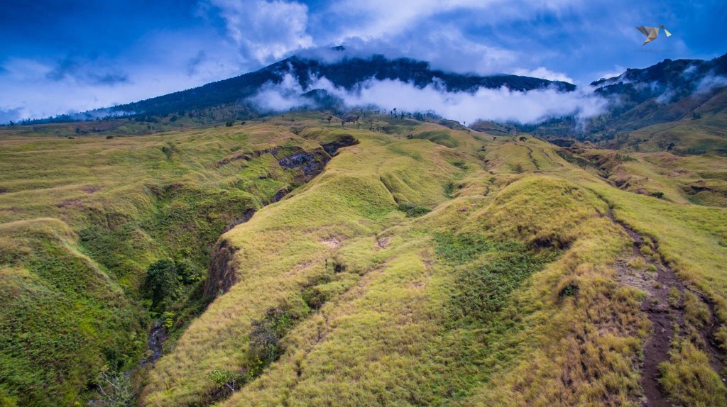 It's not the mountain we conquer, but our self #fotoudara #aerial #wonderfulindonesia #nusantara  #drone #mountain #volcano #travel #wisata