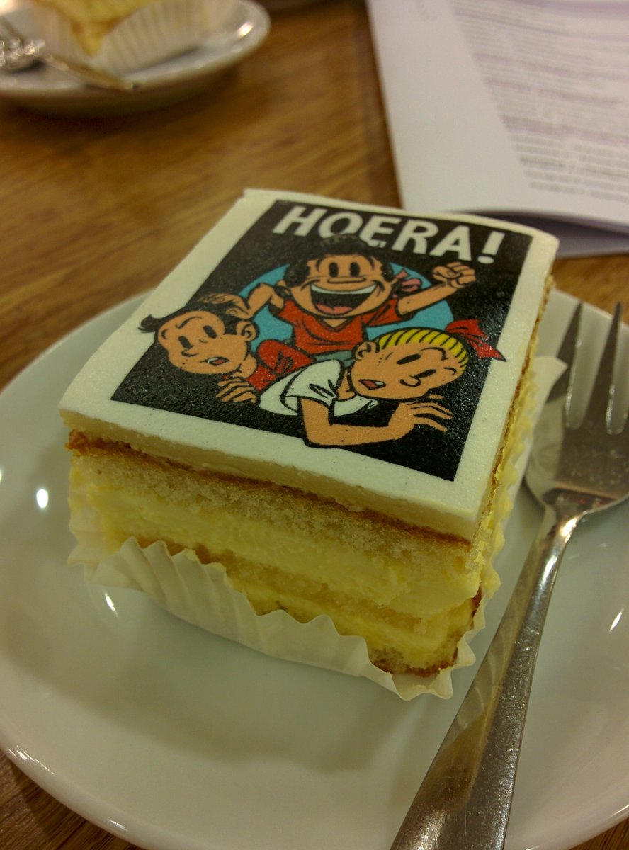 Eric Hercules, van harte met de Willy Vandersteen prijs voor Elsje. Gebak tijdens de begrotingsbehandeling.