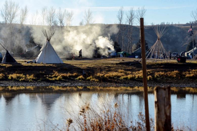 greenpeaceusa's tweet photo. Trump victory poses new challenge for Dakota Access pipeline protectors! #NoDAPL https://t.co/9g3xFXjDgS https://t.co/WGjkMeUCyh