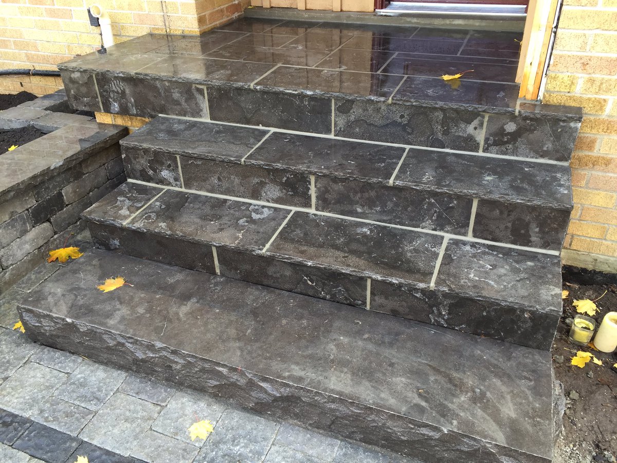 GoRedbeard's tweet image. Front entry in Richmond Hill complete. Wet laid natural stone to cover the old concrete steps, new garden wall with Antique Coping.